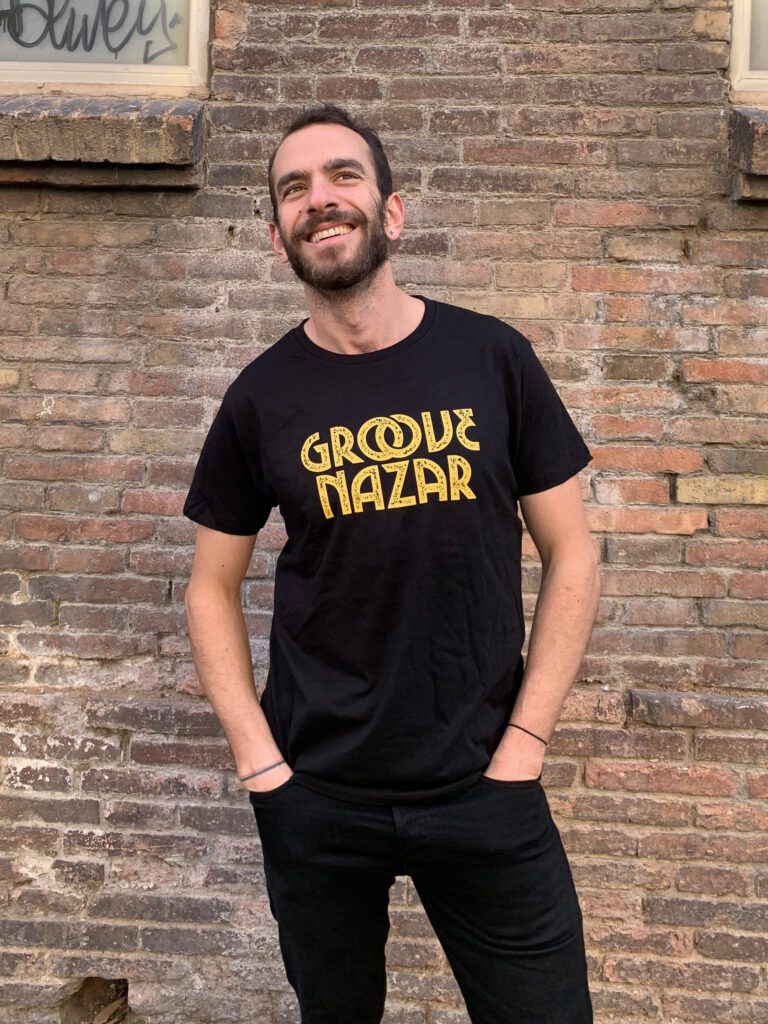 Osman wearing Groove Nazar T-shirt